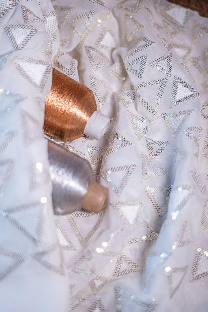 Embroidered dyeable organza